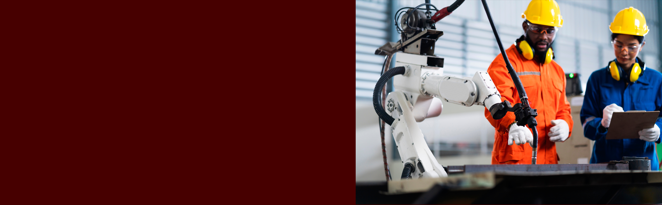 Image showing a factory worker working on a machine